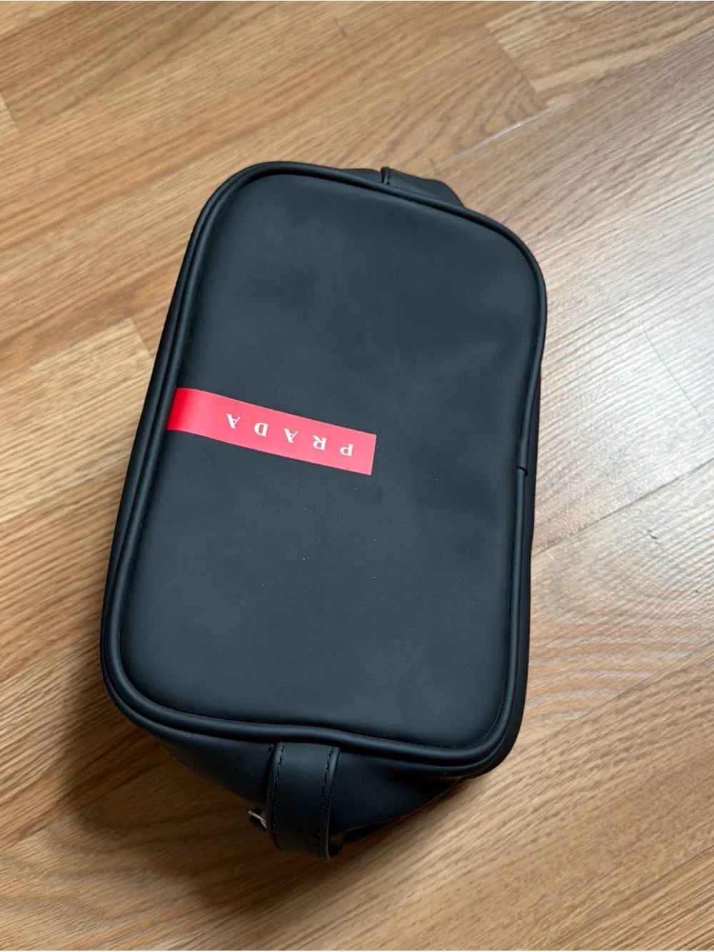 Prada Black Toiletry Pouch with Red Logo Stripe